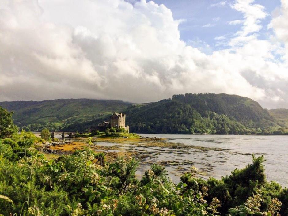 Eilean Donan Castle on its island with the mountains in the background
